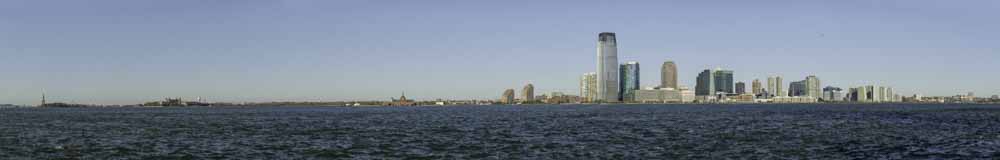 Statue of Liberty, Ellis Island, Old Railroad Station, and Jersey City Skyline