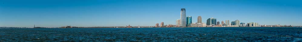 Statue of Liberty, Ellis Island, Old Railroad Station, and Jersey City Skyline